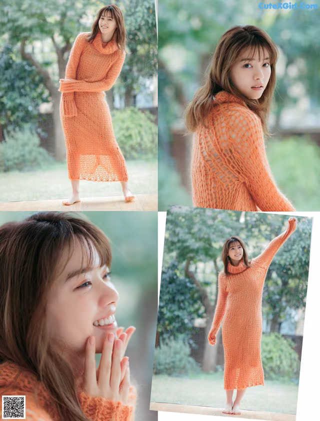 A woman in an orange sweater is posing for a picture.