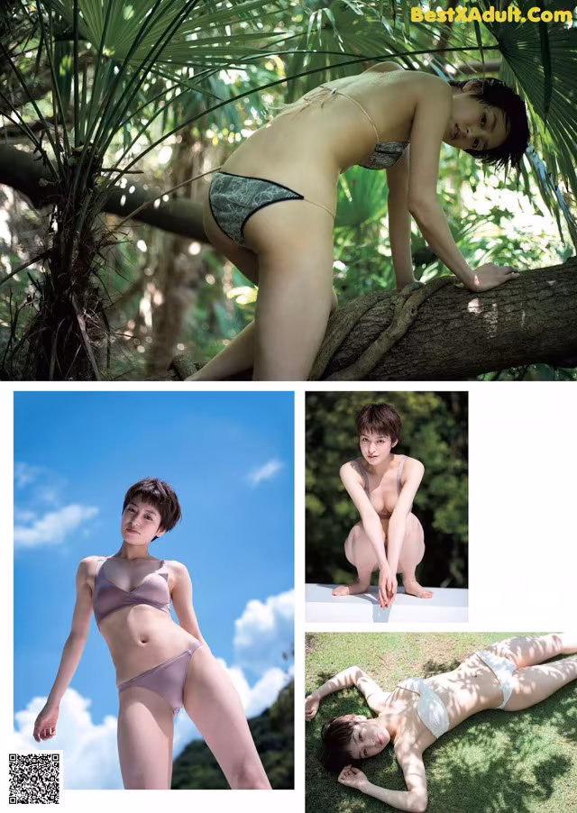A woman in a bikini posing on a tree branch.